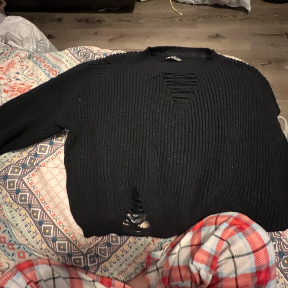 black distressed sweater